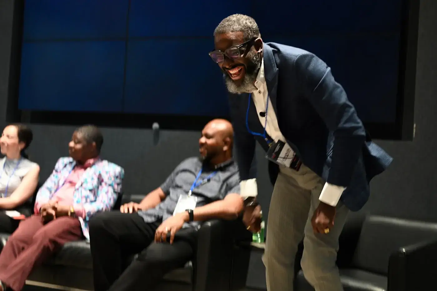 Dr. Charles Igwe engaging the room during the July event